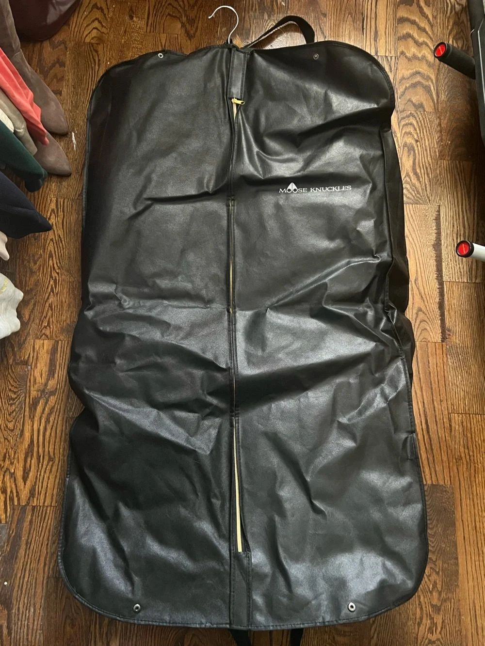 Moose Knuckles Black Winter Jacket with Gold Fur Trim And Accents
